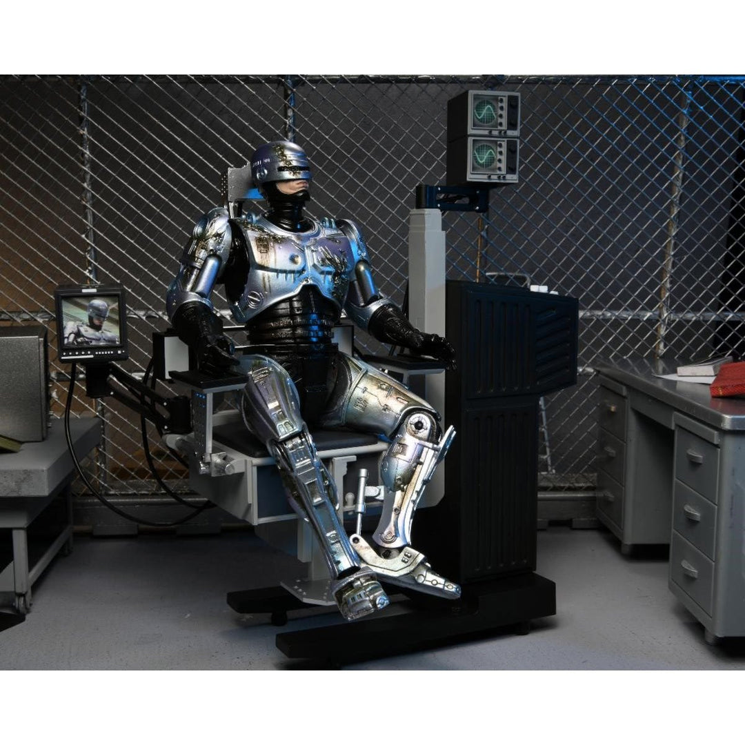RoboCop Ultimate Battle-Damaged RoboCop with Chair 7-Inch Scale Action Figure
