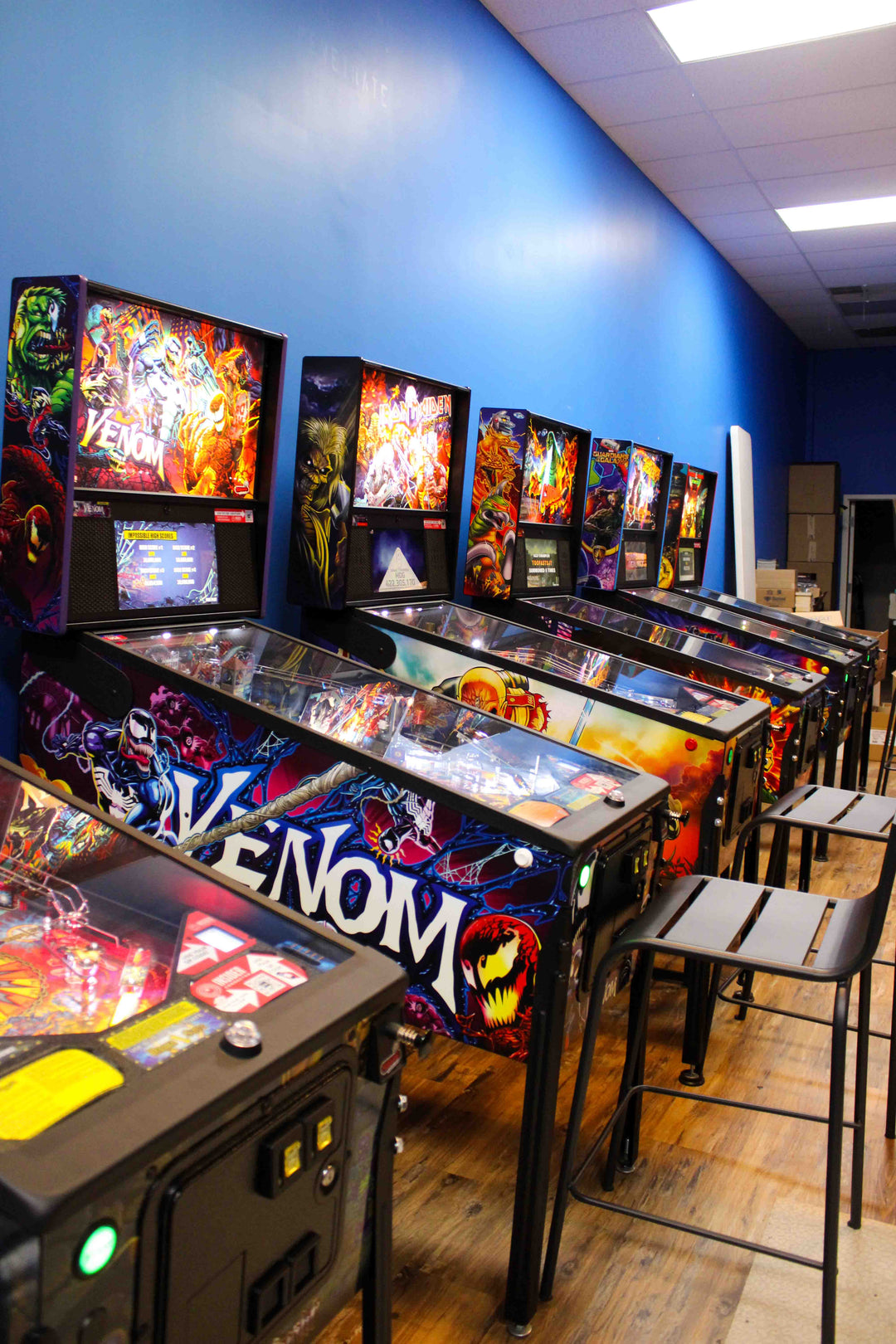 Pinball machines in planet pinball room at planet comics.